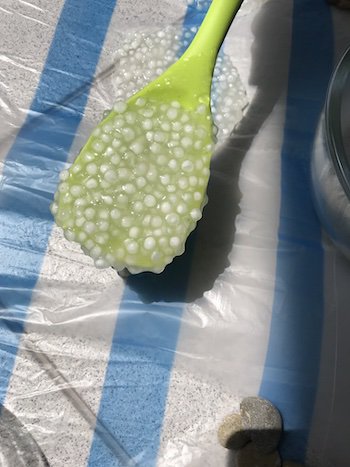 Tapioca pearls on a ladle